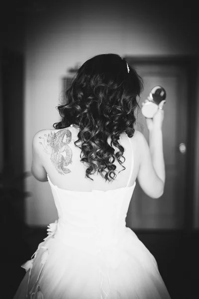 Bride with dragon tattoo on the back