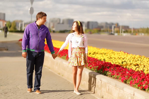 Young couple in the park at picnic. Love story