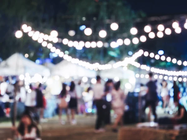 Festival Event Party with Blurred People Crowd Background