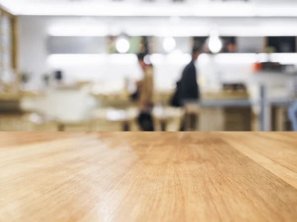Table top with blurred Shop and people interior background