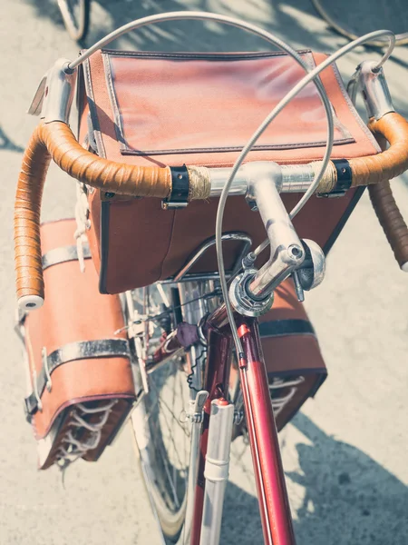 Vintage touring bicycle with bags top view