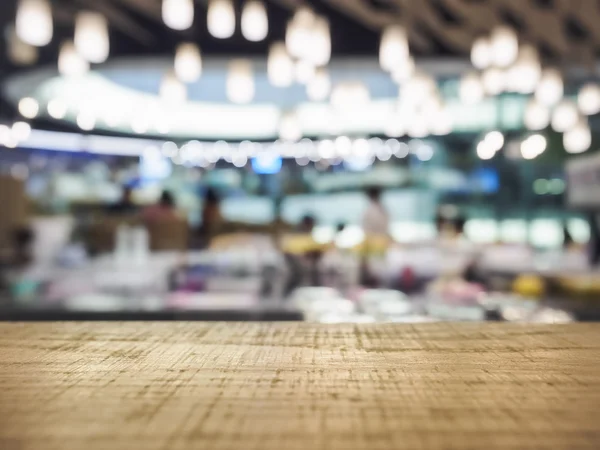 Table top Counter with Blurred Bar Restaurant Lighting interior