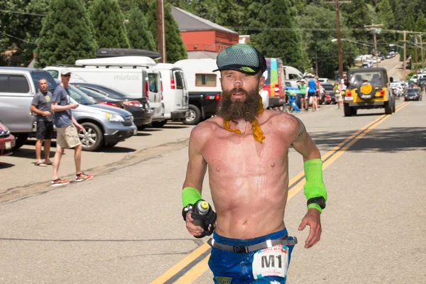 FORESTHILL CA June 27, 2015 - Man Running in Western States 100-Mile Endurance Run