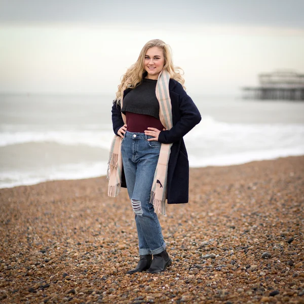 Confident Blond Teenage Girl Alone on a Cold Beach