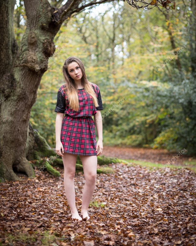 Portrait Of A Beautiful Teenage Girl Standing In A Forest Stock Photo Image By Heijo