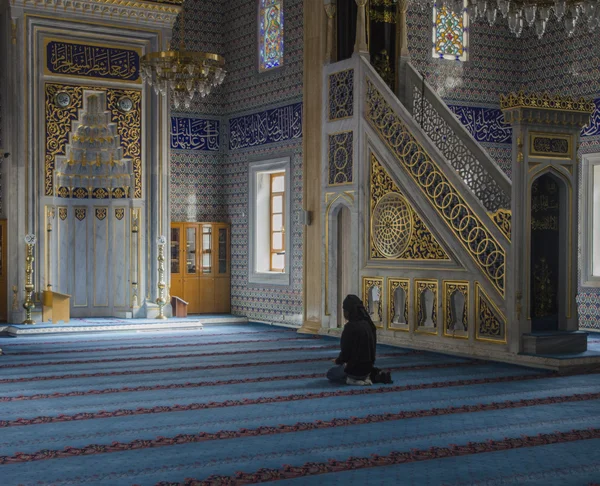 Young Muslim Woman Praying In Mosque