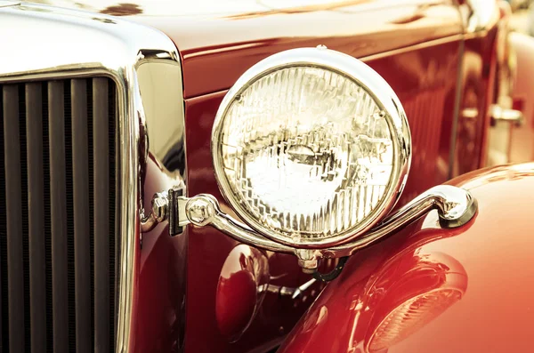 Old classic car front detail, oldtimer front lamp