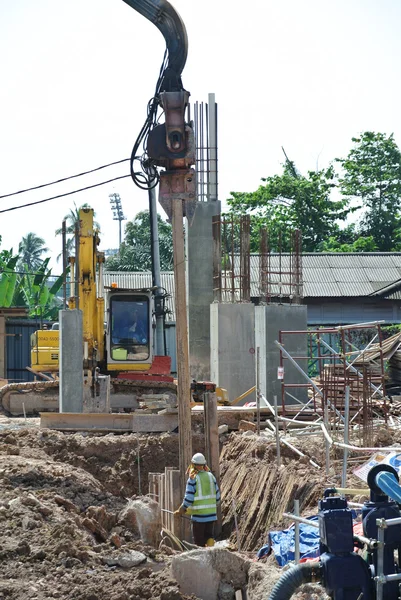 Steel sheet pile cofferdam machine at the construction site