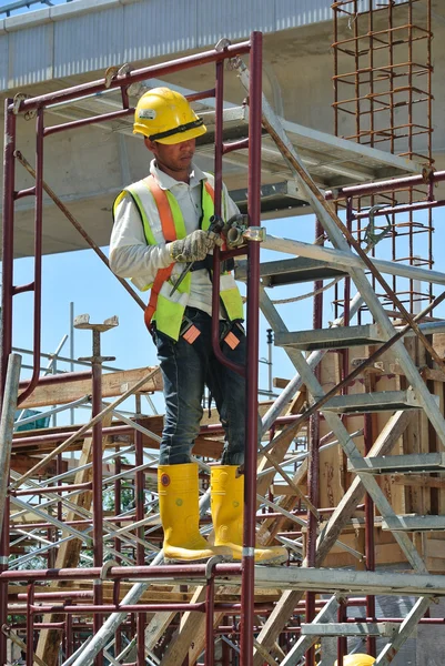 Construction workers working at high level