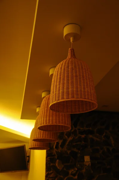 Pendant light with rattan cover