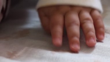 depositphotos_64618611-Tiny-Baby-Fingers