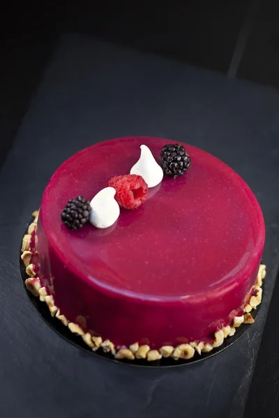 Cake and red fruit mousse