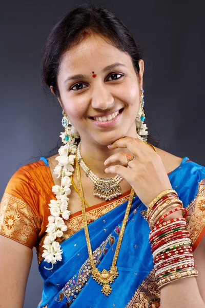 Smiling young traditional Indian woman