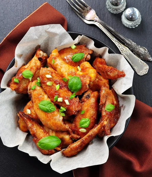 Chicken wings fried in soy sauce, rice vinegar, honey and sesame oil.