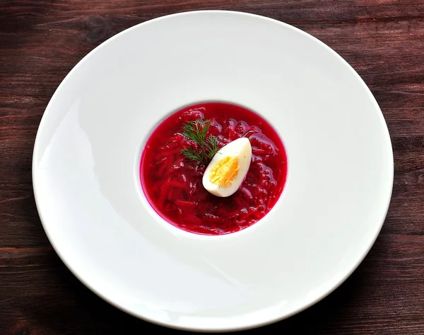 Cold summer soup from boiled beets and eggs