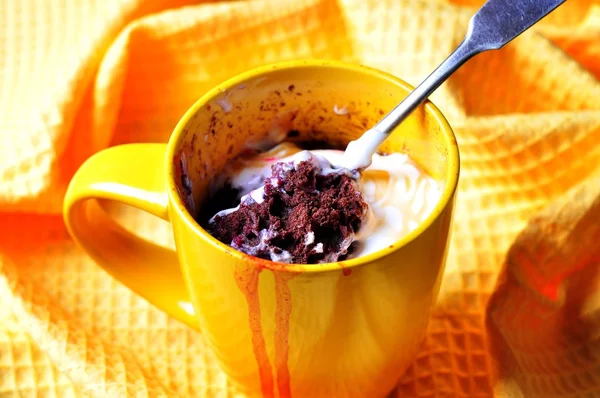Delicious Mug Cake, chocolate cherry cake cooked in a cup in the microwave