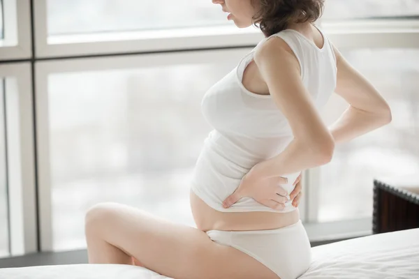 Pregnant woman having back pain