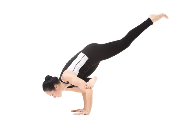 Yogi female in yoga Flying Pigeon Pose