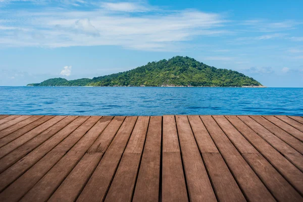 Perspective empty wooden terrace with island background