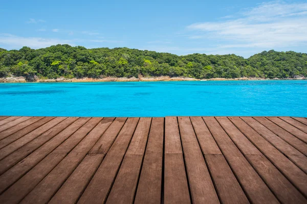 Perspective empty wooden terrace with island background