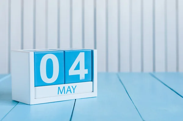 May 4th. Image of may 4 wooden color calendar on white background.  Spring day, empty space for text.  International or World Press Freedom Day
