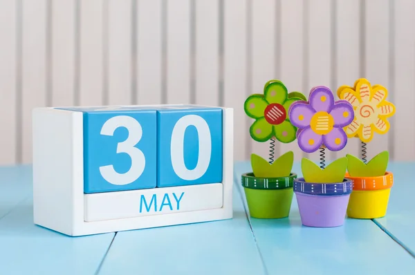 May 30th. Image of may 30 wooden color calendar on white background with flower. Spring day, empty space for text.  International or World Press Freedom Day