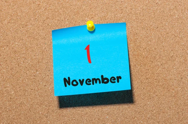 November 1st. Day 1 of month. Calendar on notice board. Autumn time. Empty space for text