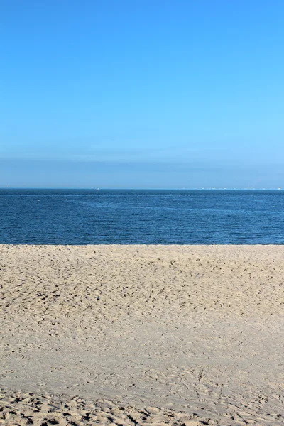 Blue Sky And Sand At The Arabian Gulf Seashore Vertical Shot