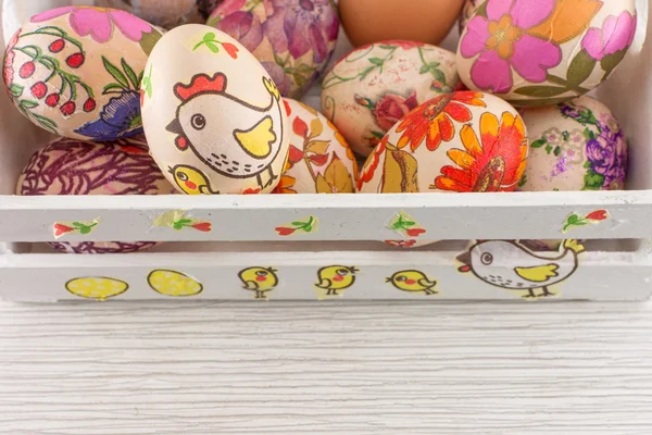 Decoupage decorated Easter eggs in decorated wooden box