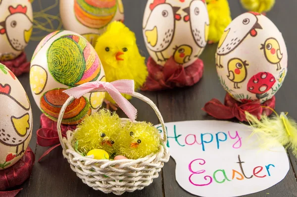 Decorated Easter eggs and toy chickens