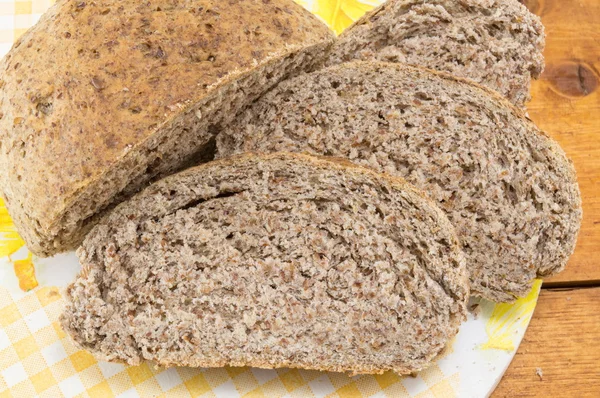 Home baked brown bread slices on the table