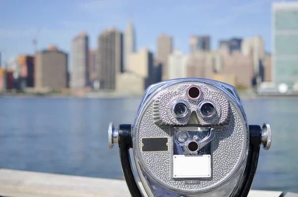 Shiny binoculars with a Manhattan view