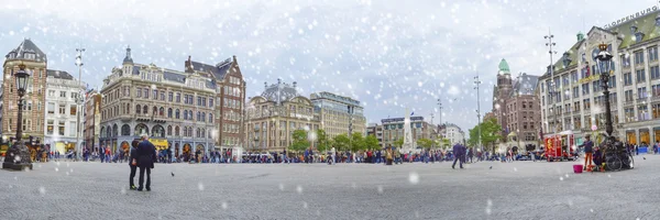 AMSTERDAM, THE NETHERLANDS - 21.09.2015. Panoramic view at Dam square with a first snow, Amsterdam, Netherlands, Europe