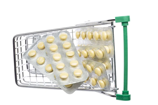 Shop cart with yellow pills blisters