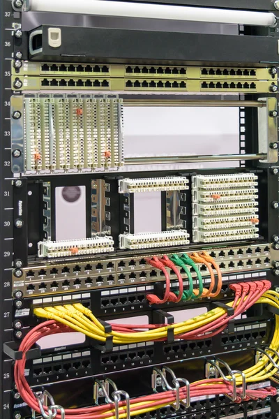 Mounting plates and racks of cables in the control cabinet Hyperline