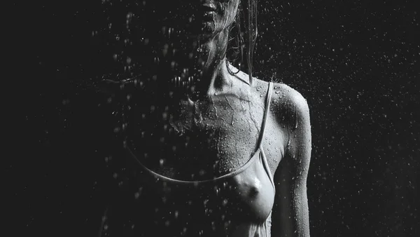 Shower. Girl in a white T-shirt standing under a shower. Black a