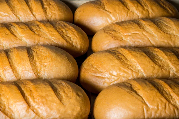 Tray with bread. long loaf