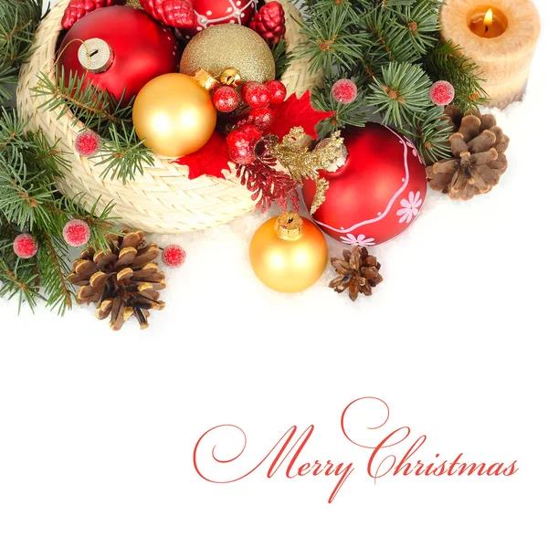 Christmas composition with Christmas balls in a wattled basket and other Christmas decor on a white background. A Christmas background with a place for the text.