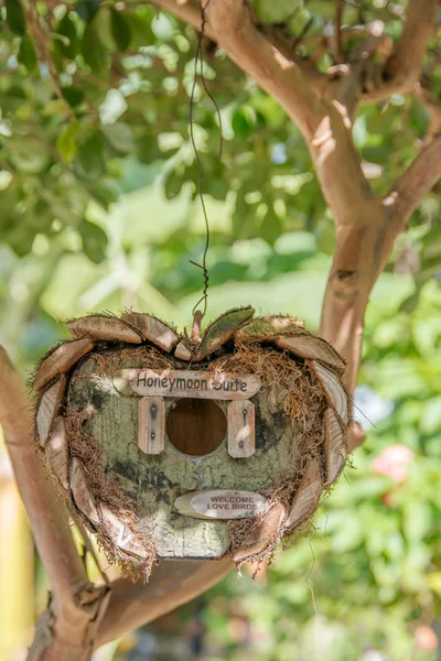 Honeymoon suite - wooden birds tree house in garden in a shape of