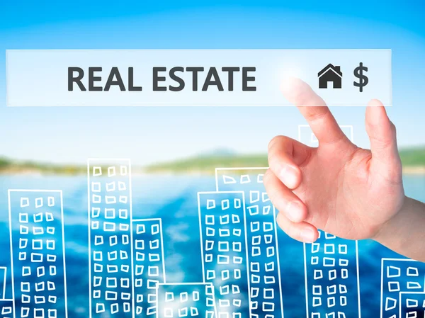 Real estate agent pressing button on virtual screen.