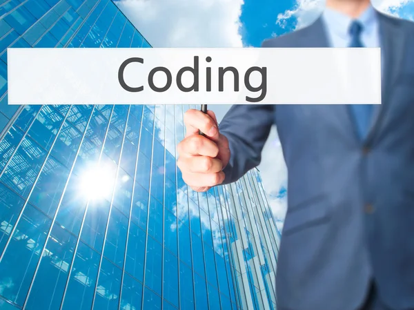 Coding - Business man showing sign