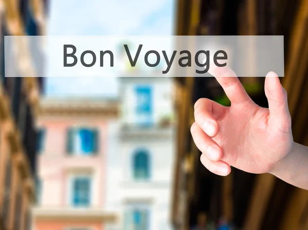 Bon Voyage (Have a Good Trip In French) - Hand pressing a button