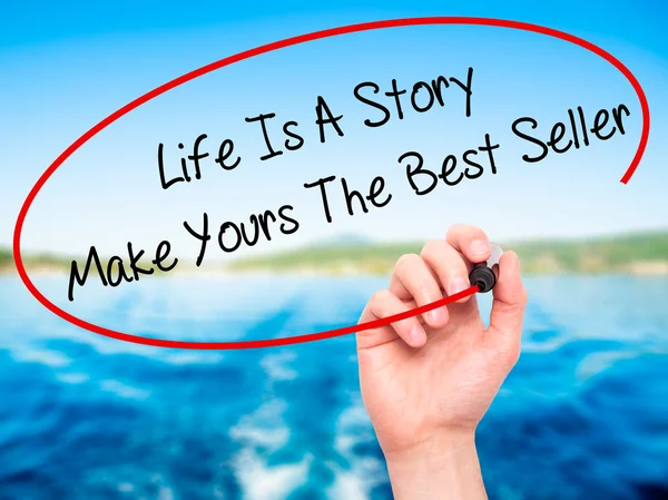 Man Hand writing Life Is A Story Make Yours The Best Seller with