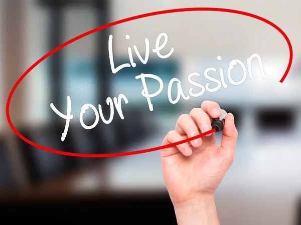 Man Hand writing  Live Your Passion with black marker on visual