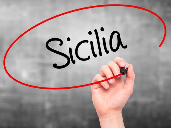 Man Hand writing Sicilia (Sicily In Italian)  with black marker