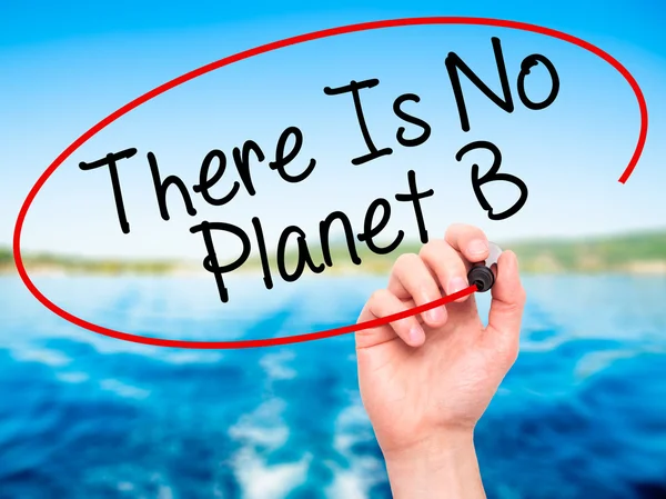 Man Hand writing There Is No Planet B with black marker on visua
