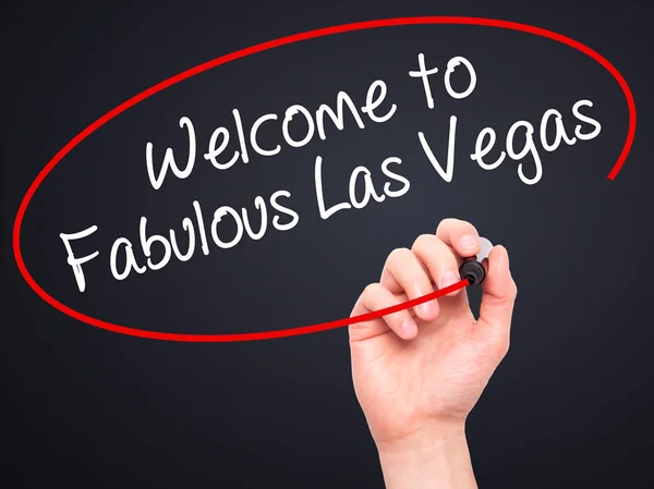 Man Hand writing Welcome to Fabulous Las Vegas with black marker