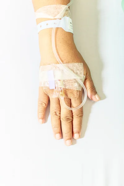 Saline solution in a patient\'s hand in the hospital