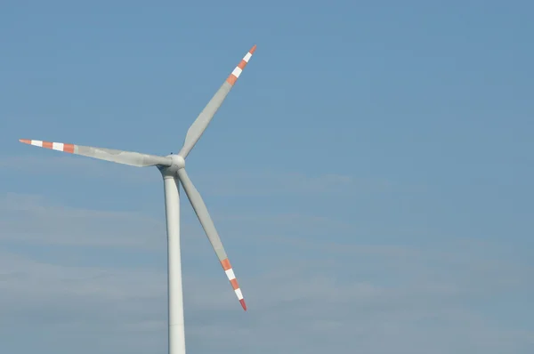 Windmill, production of green energy. Masts with blades