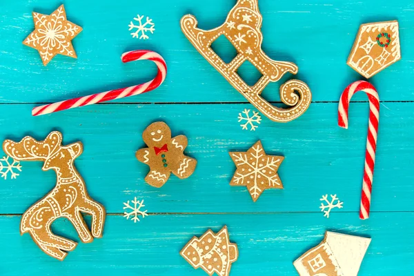 Christmas background with ornate gingerbread cookies.
